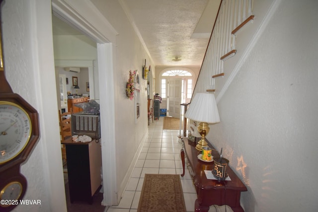 45 W Bald Eagle St, Lock Haven, PA 17745 - hall featuring light tile patterned flooring, stairs, and a textured ceiling