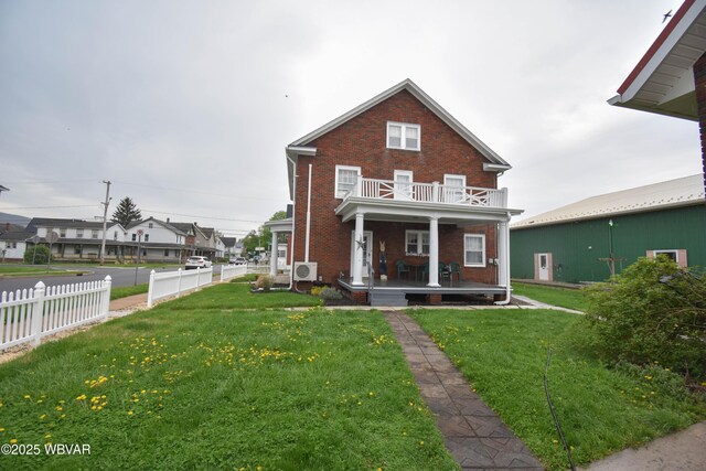 45 W Bald Eagle St, Lock Haven, PA 17745 - back of property with a porch, brick siding, and a balcony