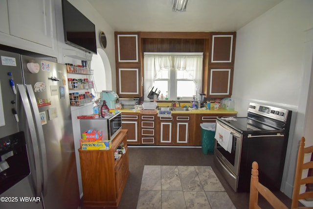 45 W Bald Eagle St, Lock Haven, PA 17745 - kitchen featuring appliances with stainless steel finishes, a sink, and light countertops