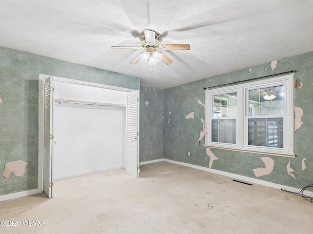5667 Austinville Rd, Columbia Crossroads, PA 16914 - unfurnished bedroom with a closet, a ceiling fan, baseboards, and carpet flooring