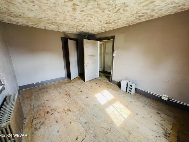 unfurnished bedroom featuring light hardwood / wood-style floors