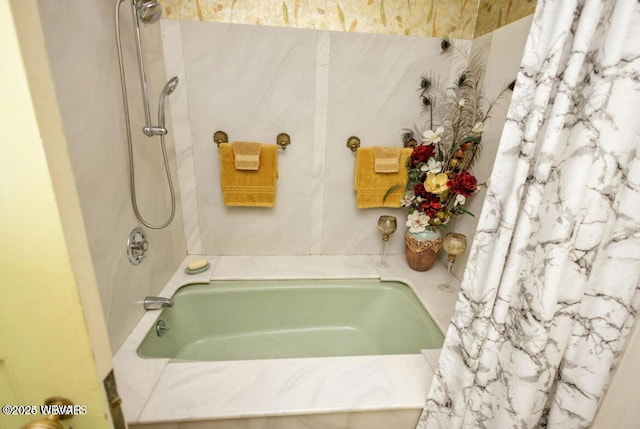 bathroom with shower / tub combo with curtain