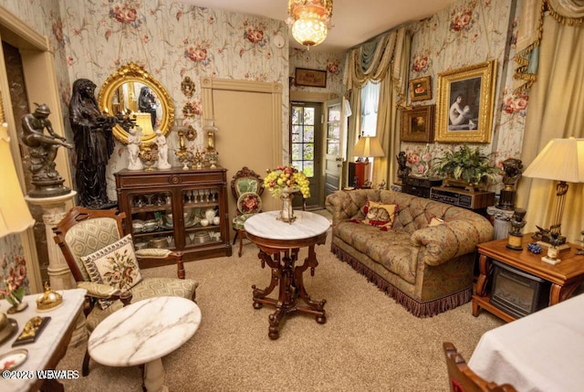 sitting room featuring carpet floors