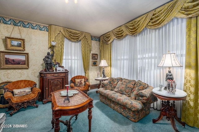 sitting room featuring carpet flooring