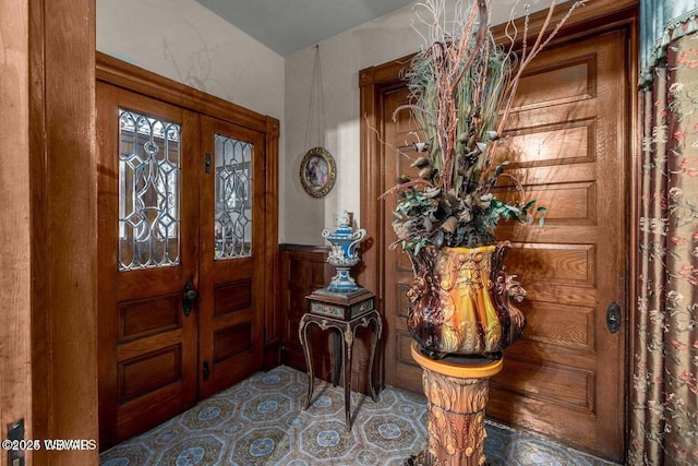 entryway featuring french doors