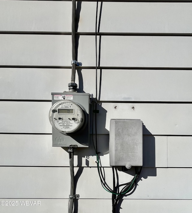 exterior details featuring electric meter