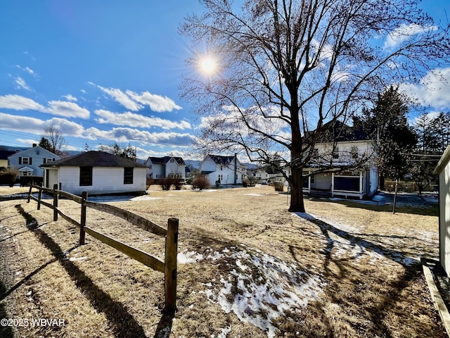 view of yard featuring a residential view