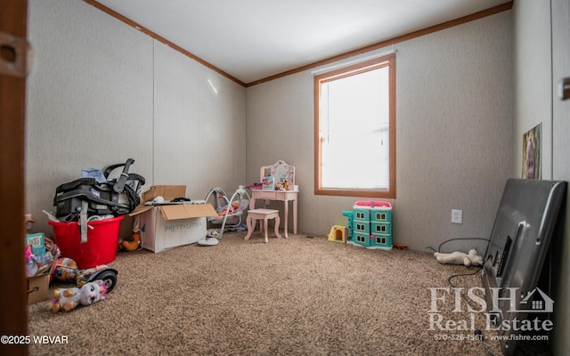 rec room featuring carpet and crown molding