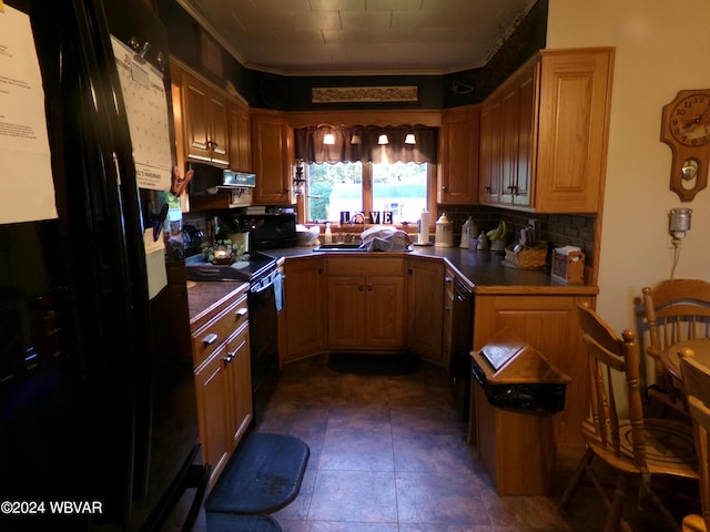 kitchen featuring backsplash, dark tile patterned floors, crown molding, sink, and black appliances