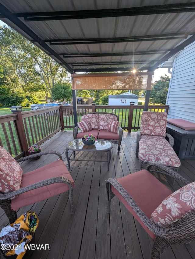 deck featuring a lawn