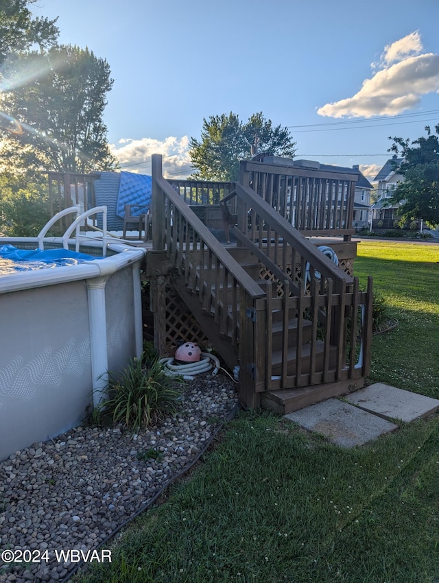 exterior space featuring a deck and a yard