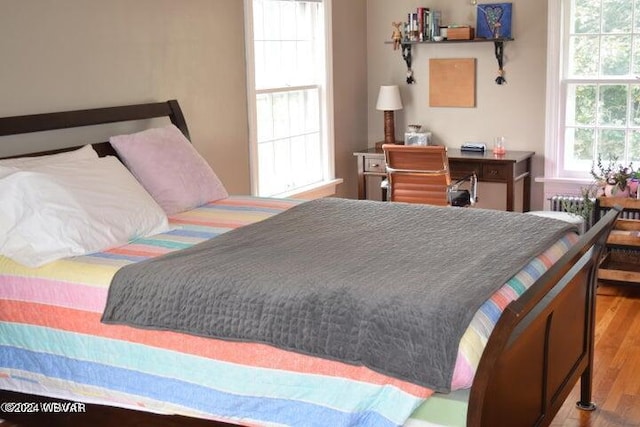 bedroom featuring light hardwood / wood-style flooring