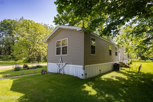 394 Rte 973, Cogan Station, PA 17728 - view of side of home with a yard