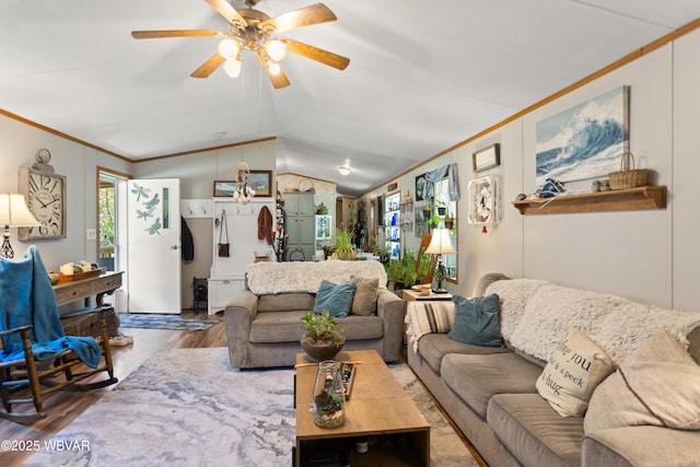 394 Rte 973, Cogan Station, PA 17728 - living area featuring vaulted ceiling, wood finished floors, ceiling fan, and crown molding