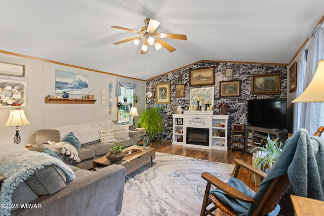 394 Rte 973, Cogan Station, PA 17728 - living area with wood finished floors, lofted ceiling, a ceiling fan, a fireplace, and crown molding