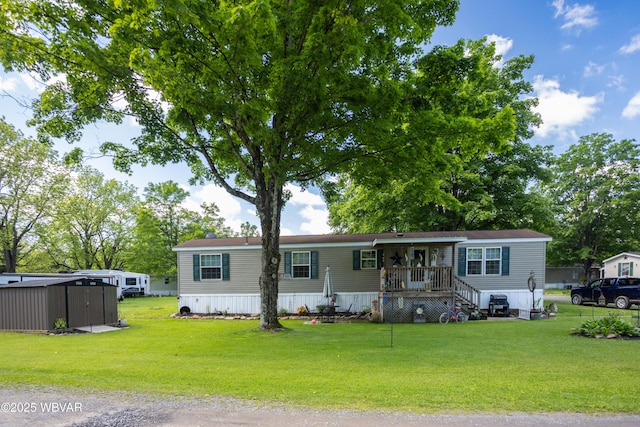 394 Rte 973, Cogan Station, PA 17728 - manufactured / mobile home with a front yard and covered porch
