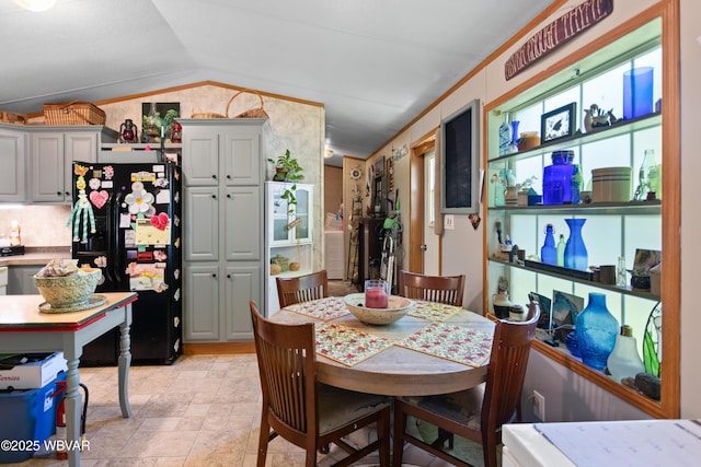 394 Rte 973, Cogan Station, PA 17728 - dining area with lofted ceiling and light stone finish flooring