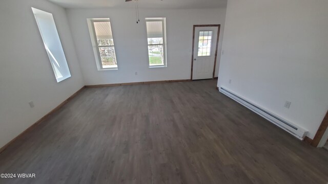 308 State St, Jersey Shore, PA 17740 - empty room featuring dark hardwood / wood-style flooring and a baseboard radiator