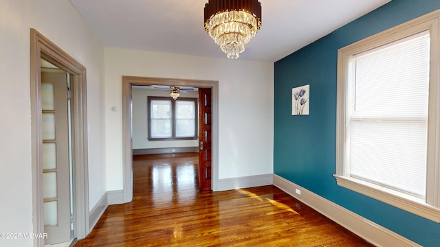 665 5th Ave, Williamsport, PA 17701 - interior space featuring baseboards, ceiling fan with notable chandelier, and wood finished floors