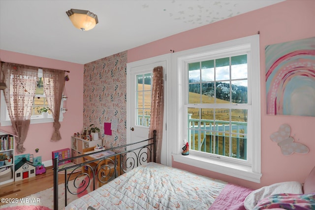 bedroom with wood-type flooring