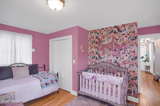 bedroom with hardwood / wood-style floors