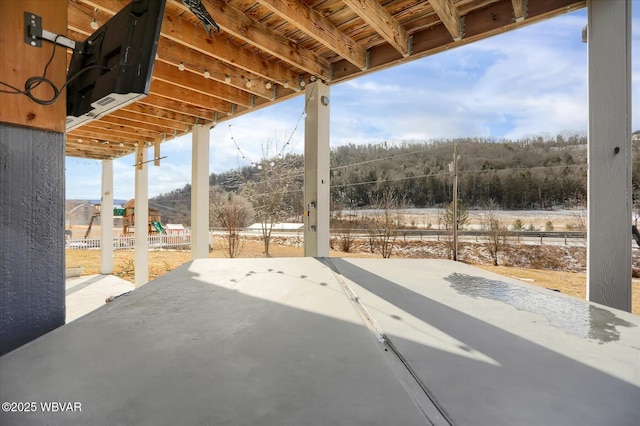 view of patio with a playground