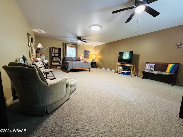 bedroom featuring carpet, baseboard heating, and ceiling fan