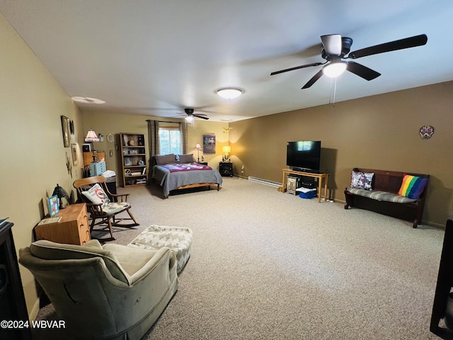 bedroom featuring ceiling fan, carpet floors, and a baseboard heating unit