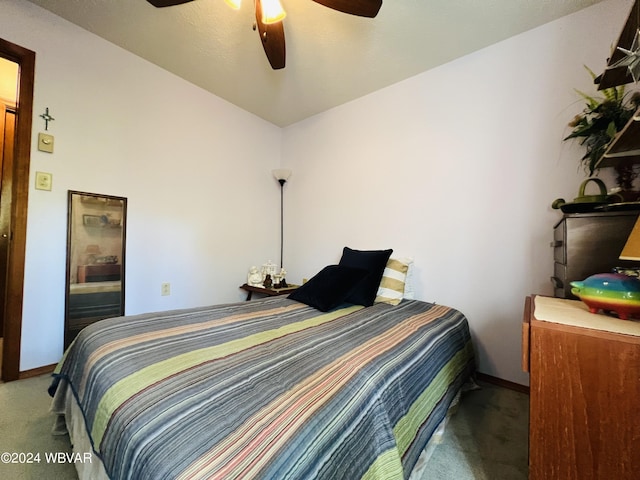 bedroom with dark carpet and ceiling fan