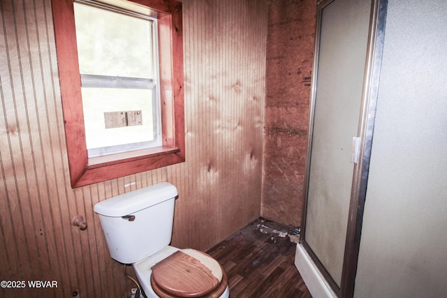 486 Mcintyre Way, Cogan Station, PA 17728 - full bathroom with wooden walls, toilet, wood finished floors, and a shower stall
