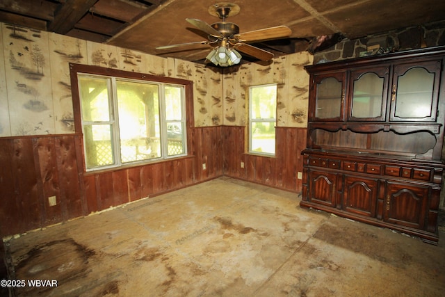 486 Mcintyre Way, Cogan Station, PA 17728 - spare room with wooden walls, a wainscoted wall, and a ceiling fan