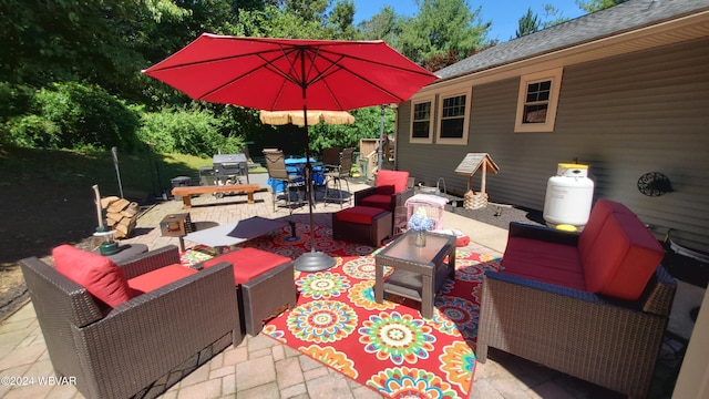 view of patio / terrace with area for grilling and an outdoor hangout area