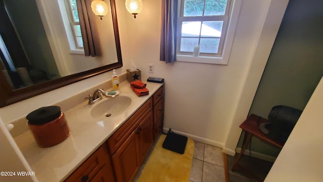 bathroom with tile patterned floors and vanity