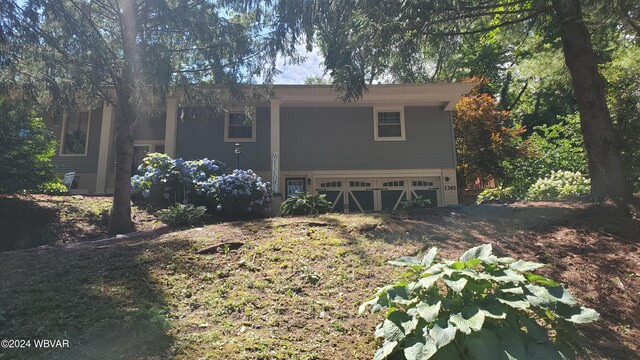 exterior space featuring a garage