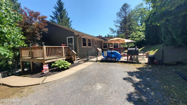 view of front of home with a deck