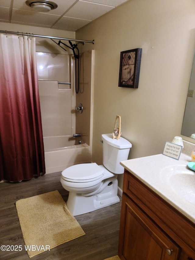 full bathroom with toilet, vanity, shower / bathtub combination with curtain, and wood-type flooring