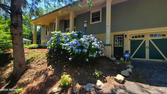 view of home's exterior featuring a garage