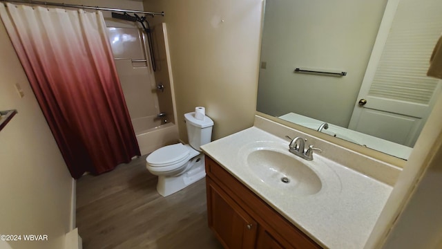 full bathroom with vanity, wood-type flooring, toilet, and shower / bath combo with shower curtain