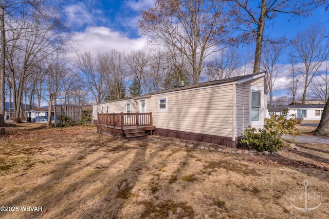 rear view of property with a deck