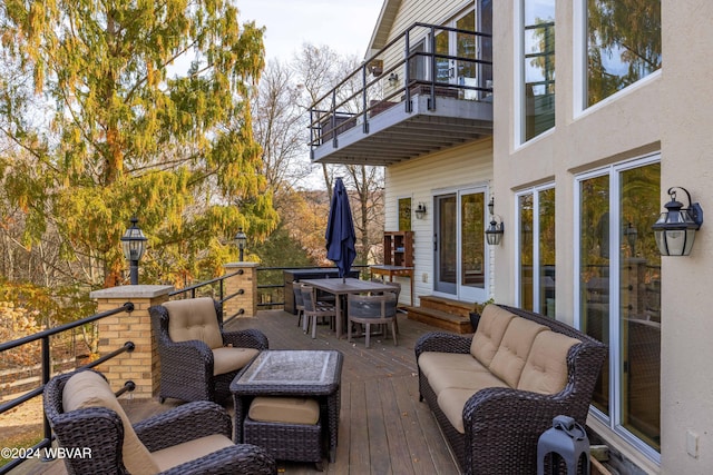 wooden deck with outdoor lounge area