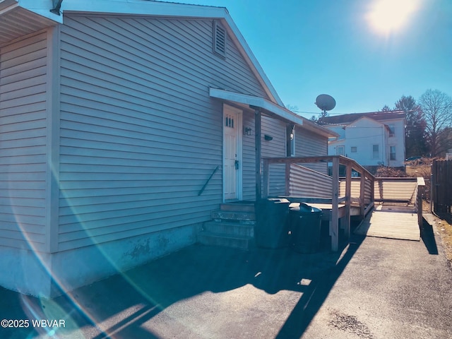 view of front of house with a wooden deck