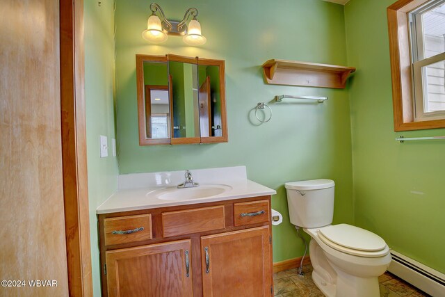 65 Spring St, Lock Haven, PA 17745 - half bathroom with a baseboard heating unit and vanity