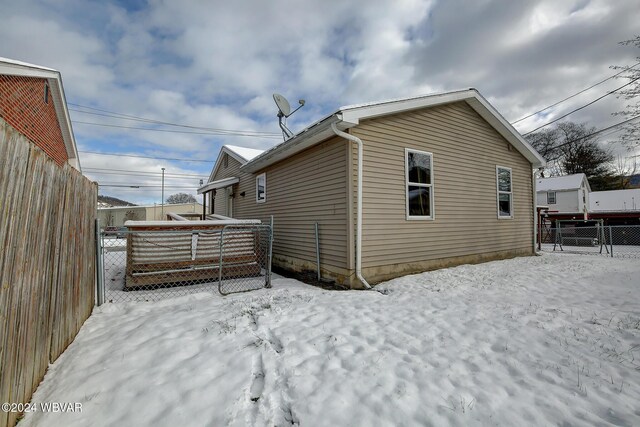 65 Spring St, Lock Haven, PA 17745 - view of snow covered rear of property