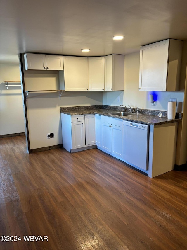 kitchen featuring dark hardwood / wood-style flooring, white cabinetry, dishwasher, and sink