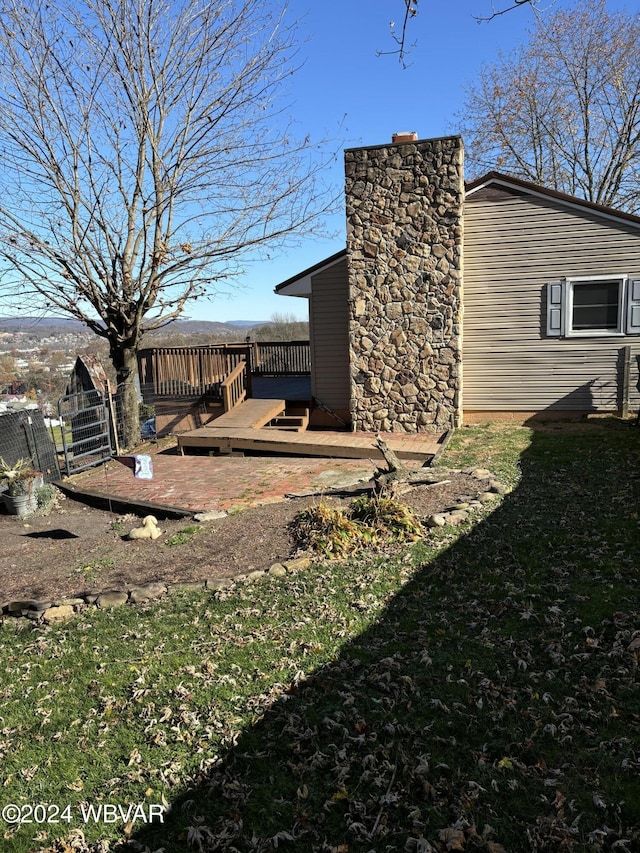 view of yard featuring a deck