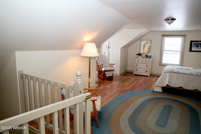 190 E Winter Rd, Loganton, PA 17747 - bedroom featuring wood finished floors, lofted ceiling, and baseboards