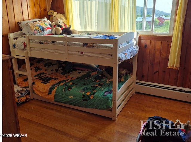 1520 Haagen Ln, Beech Creek, PA 16822 - bedroom featuring light wood finished floors and a baseboard heating unit