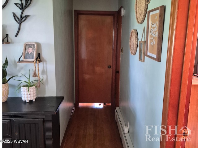 1520 Haagen Ln, Beech Creek, PA 16822 - hallway featuring dark wood finished floors and a baseboard radiator
