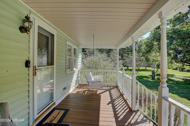 wooden terrace with covered porch