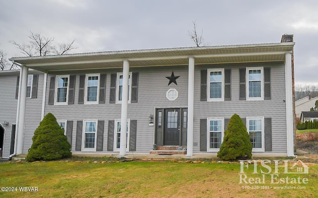 view of front of house with a front yard